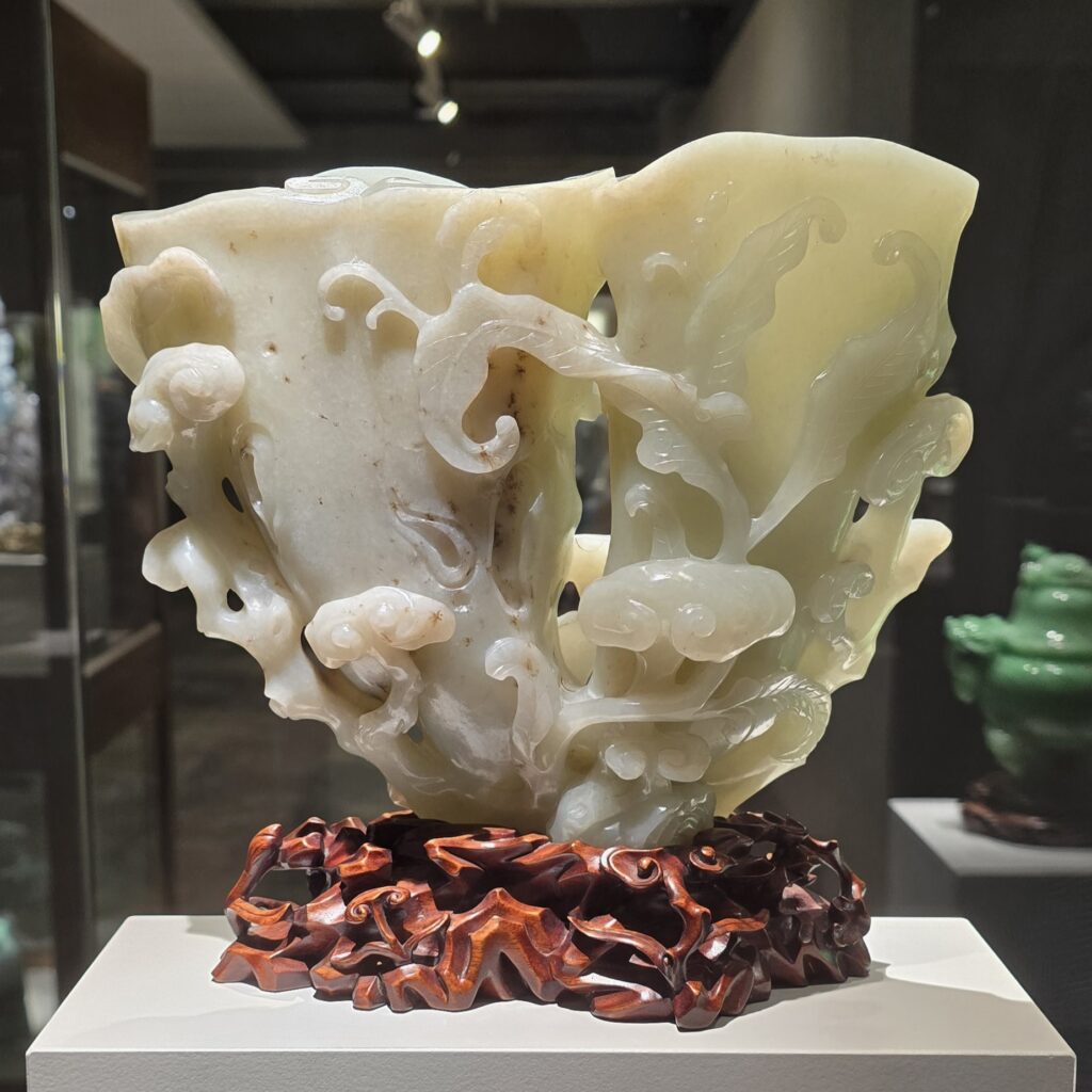 Entwined double fungus vase carved from jade.