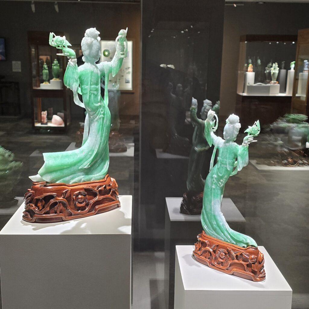 Green and white jadeite carvings depicting Yang Guifei