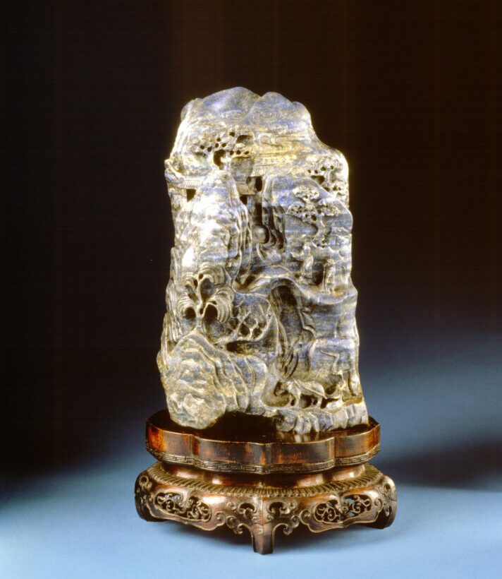 Mountain scene carved on lapis lazuli from China