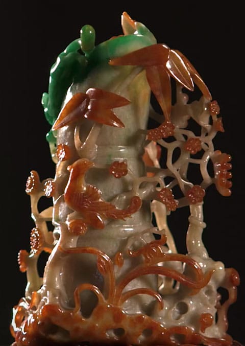 Jade ewer in three colors, green for the lizzard, brown for the bamboo, and white for the bottle.